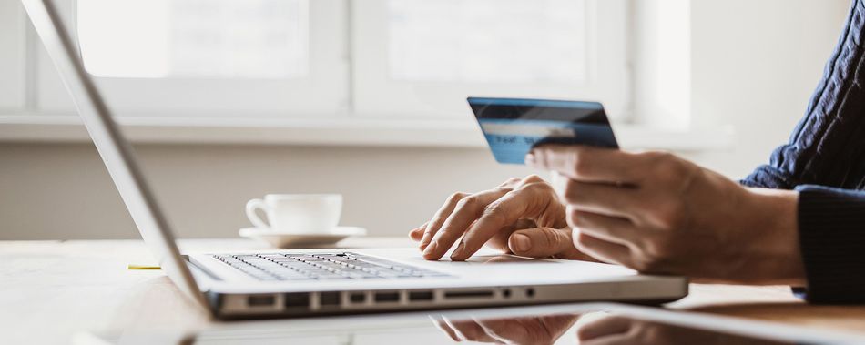 Ordering online. Woman using laptop computer with credit card, banner. Business, online shopping, e-commerce, internet banking, spending money, working from home concept