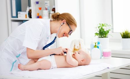Doctor pediatrician and baby patient