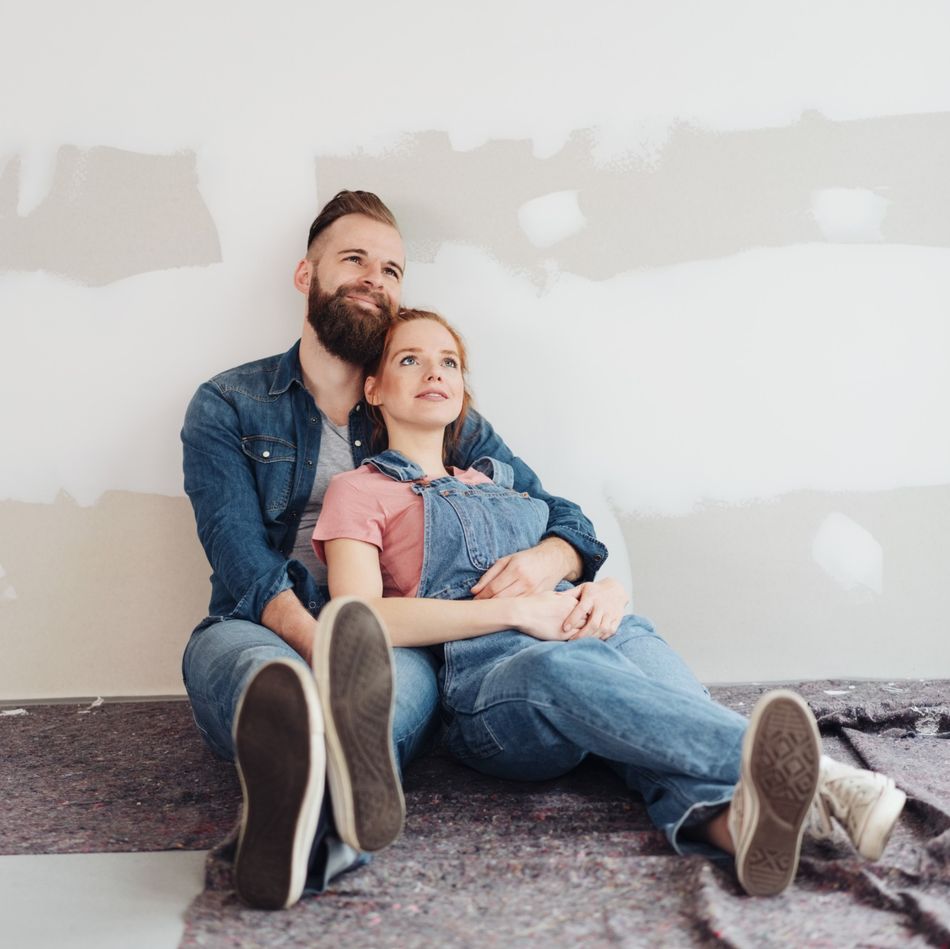Loving young couple taking a break fro renovations