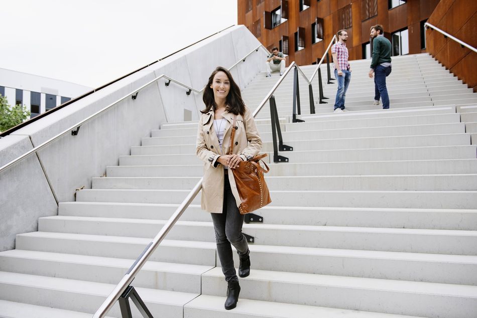 Woman walking down stairs
