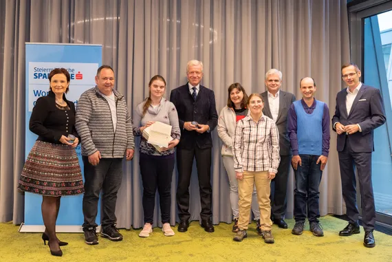Drei Männder in Tracht.
