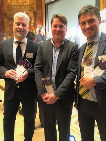 Gruppenfoto mit drei Fondsmanagern der Erste Asset Management