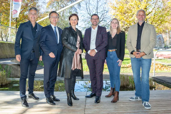 Drei Männder in Tracht.