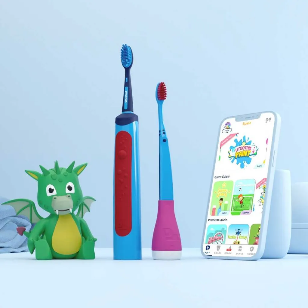 Playbrush-Zahnbürste und Smartphone mit der dazugehörigen App