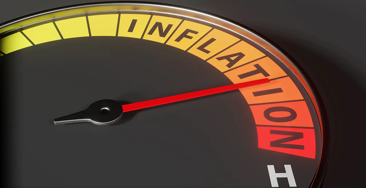 Tachometer mit der Aufschrift INFLATION, rote Nadel sehr weit rechts