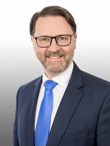 Fuchs Wolfgang lächelt in die Kamera